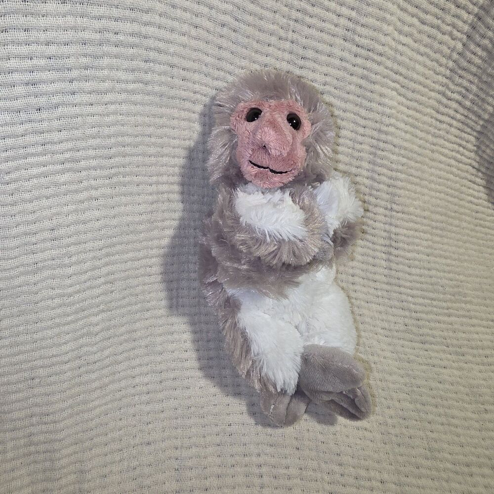 Wild Republic Huggers Japanese Macaque (Snow Monkey) plush slap bracelet.
